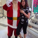 Some of the people who want to pose with Santa are not kids