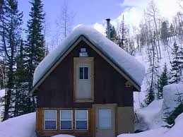 Photo of gabled roof with snow on it